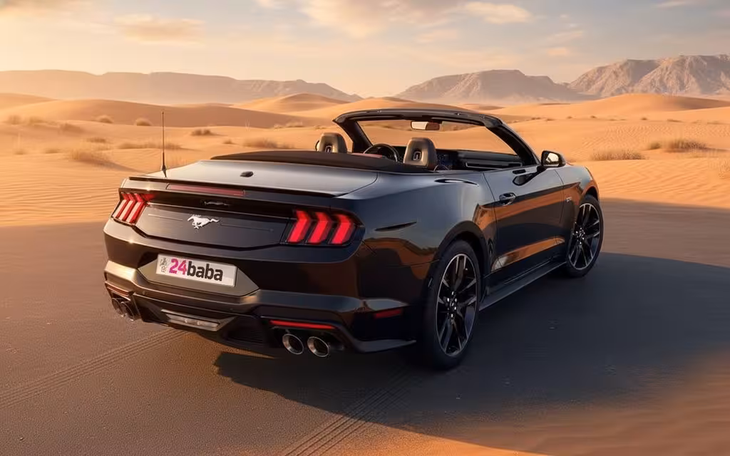 Ford Mustang 2024 Black rear view showing taillights – rental in Dubai