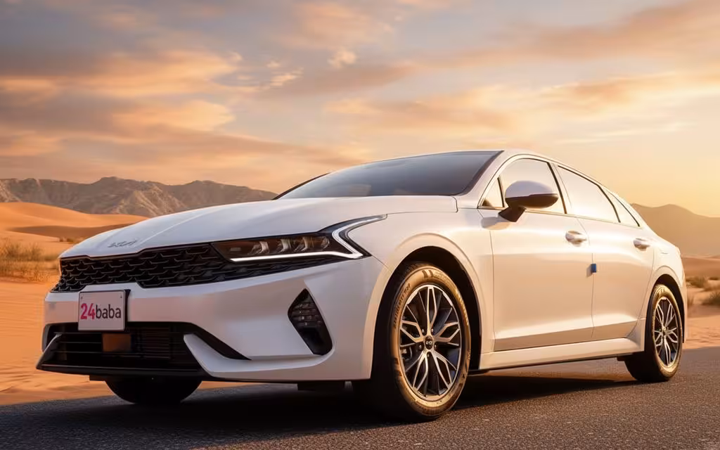 Kia K5 2022 White front view with headlights – rental in Dubai