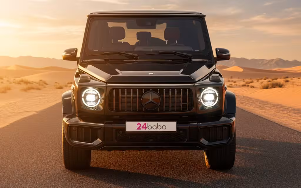 Mercedes G63 2025 Black front view with headlights – rental in Dubai