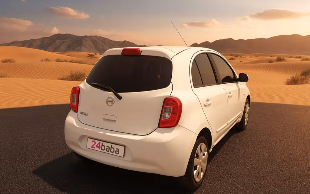 Nissan Micra 2020 White rear view showing taillights – rental in Dubai
