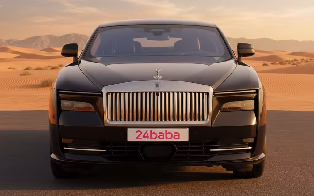 RollsRoyce Spectre 2025 Black front view with headlights – rental in Dubai