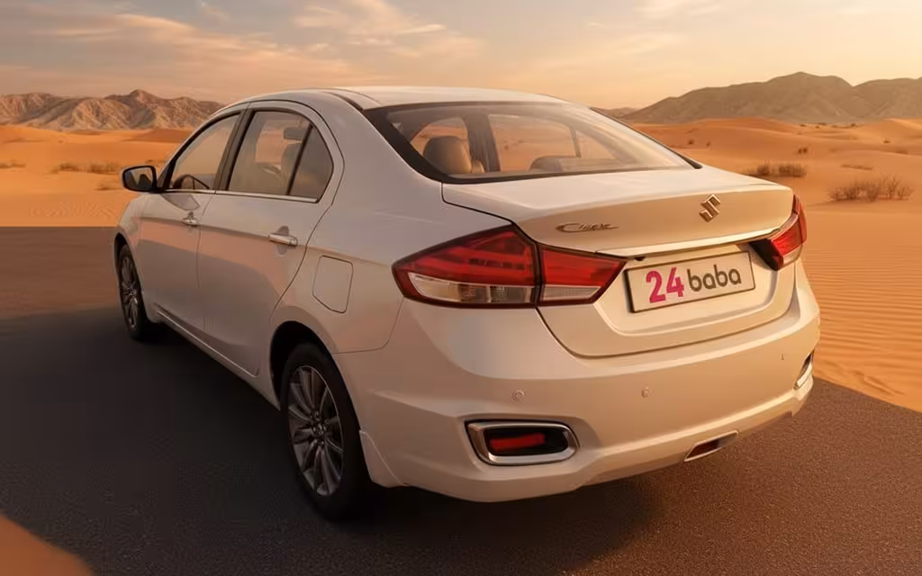 Suzuki Ciaz 2025 White rear view showing taillights – rental in Dubai