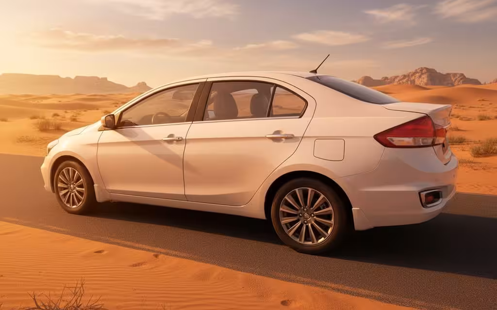 Suzuki Ciaz 2025 White side profile – rental in Dubai