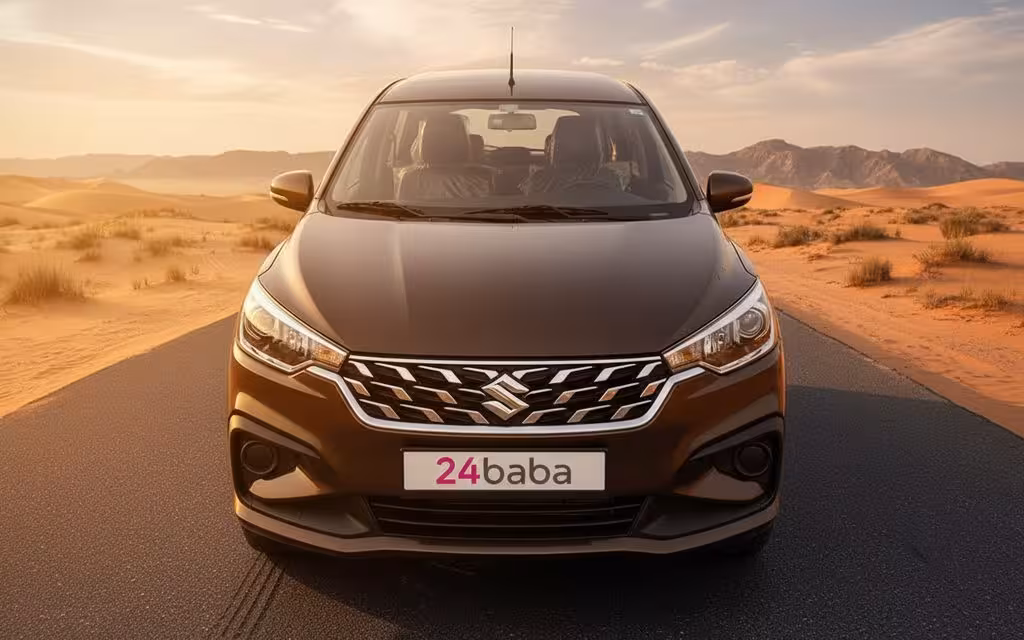 Suzuki Ertiga 2024 Brown front view with headlights – rental in Dubai
