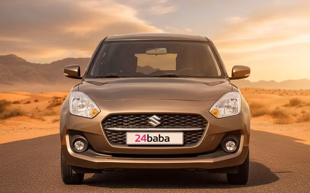 Suzuki Swift 2023 Grey front view with headlights – rental in Dubai