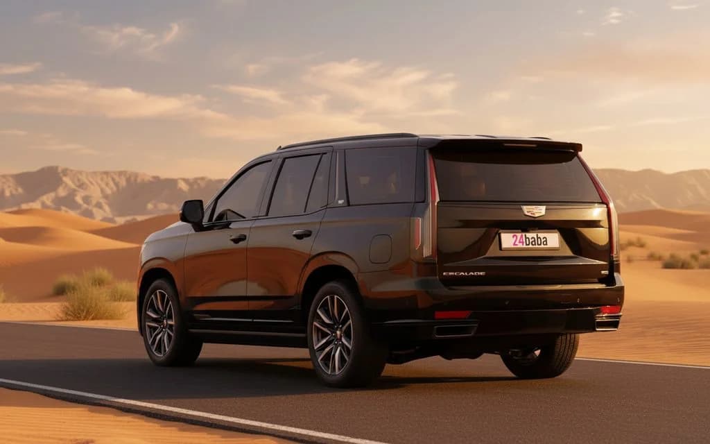 Cadillac Escalade 2022 Black rear view showing taillights – rental in Dubai