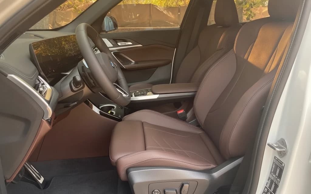 BMW X1 2025 White front seats – rental in Dubai