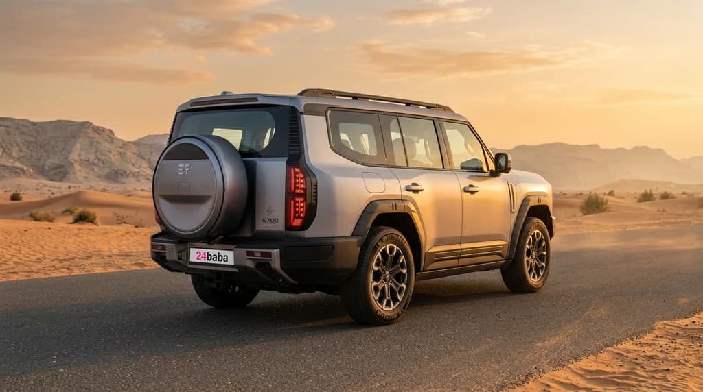 Jetour G700 2027 Grey rear three-quarter view with tailgate spare wheel – rental in Dubai