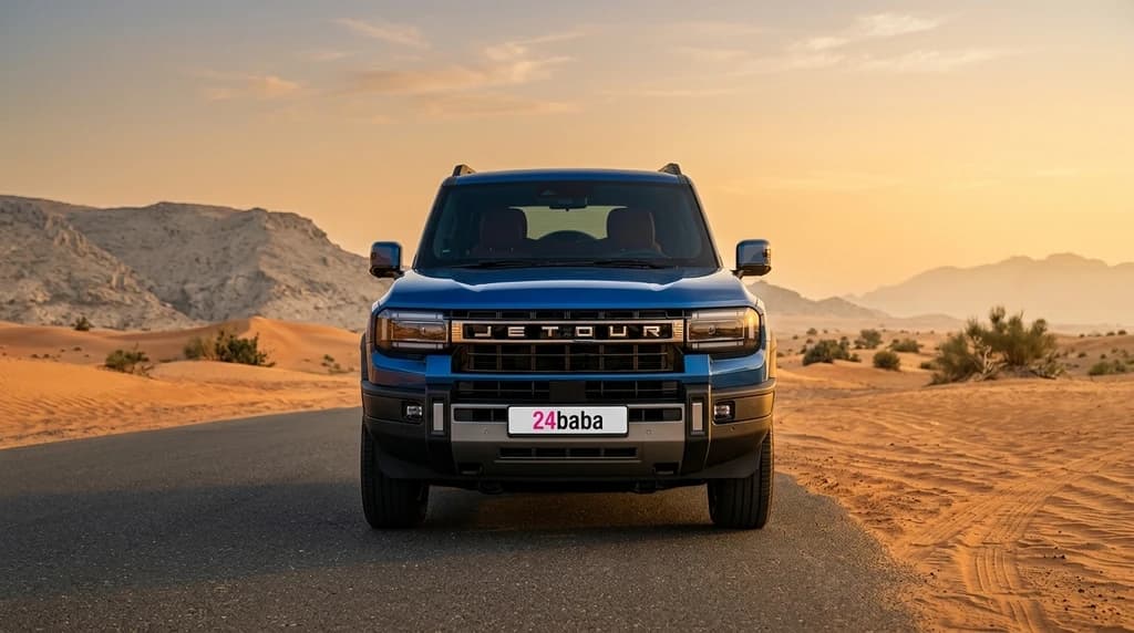 Jetour G700 Flagship 2027 Blue head on front view with LED headlights and grille – rental in Dubai