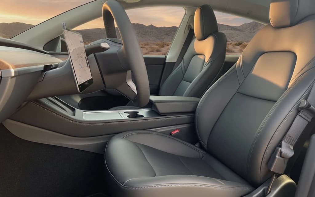 Tesla Model Y 2023 Gray front seats – rental in Dubai