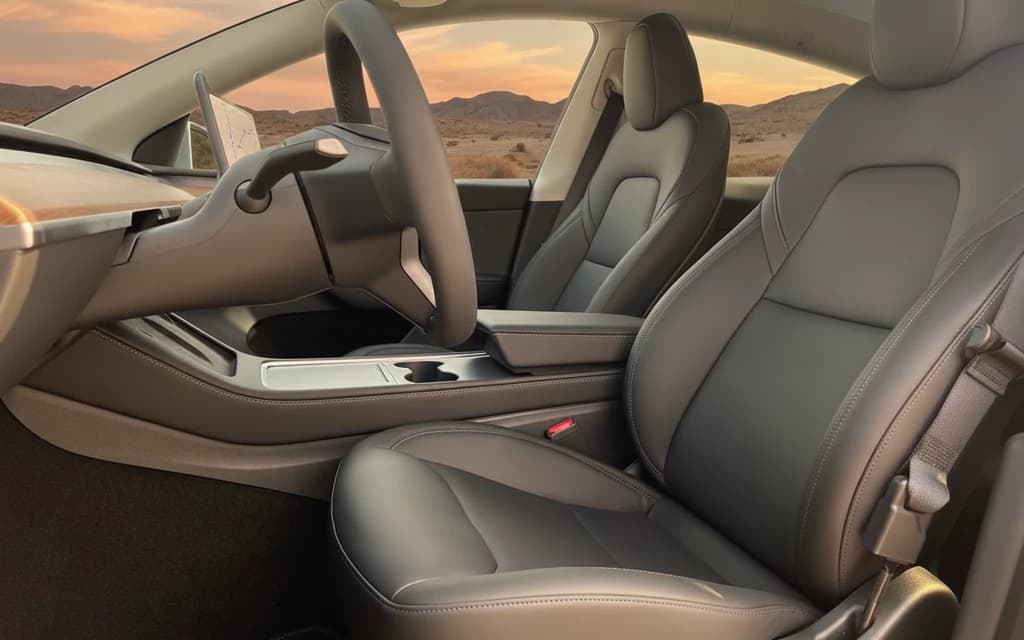 Tesla Model Y 2023 Gray front seats – rental in Dubai
